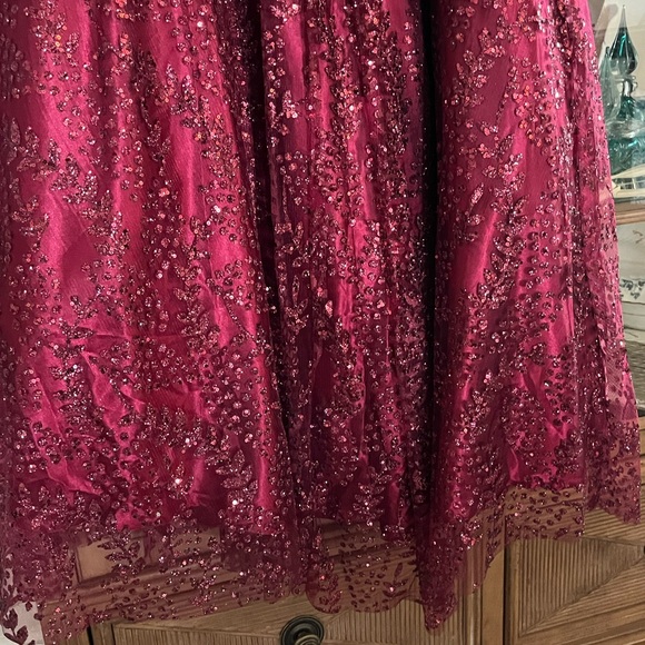 Beautiful strapless burgundy embellished gown. - Picture 4 of 6